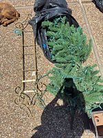Tree piece with lights, metal stake visible