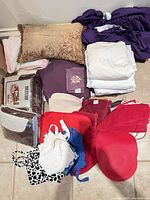 All items laid out showing variety of textiles and accessories