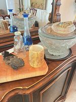 Group shot showing punch bowl set, blue vases, milk bottle, ceramic mug, metal toy car