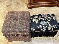 Both ottomans side by side showing overall design, fabrics, tufted tops and fringe