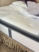 Mattress side profile showing pillow-top quilting and hybrid construction
