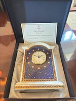 Clock in original presentation box with certificate and packing