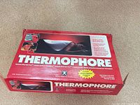 Front of red Thermophore box
