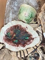 Cup/planter and leaf dish in packing, showing color, glaze and texture