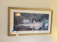 Front view of framed Degas ballet print on wall
