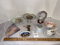 Group shot of all porcelain and ceramic items arranged on table