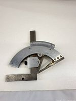 Full view of bevel protractor showing body, scale and arm