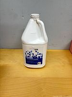 Front view of full 1-gallon Salon Pro shampoo jug