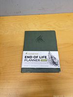 Front view of sealed Clever Fox End of Life Planner on table