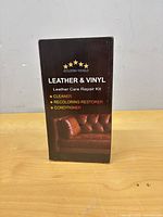 Front view of sealed Startso World Leather & Vinyl Care Repair Kit box