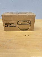 Front of sealed cardboard box showing product name and outline drawing