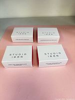 Four sealed Studio 1886 jewelry boxes