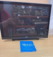 Front view of Ugee 1910B monitor and manual