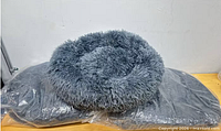 Two vacuum-packed beds with one unpacked, showing overall style and colour
