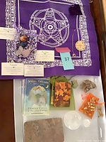Full lot with oracle deck, cloth, pendulum set, crystals, stone slab