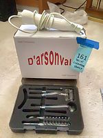 Overall lot showing wand, electrodes in tray, branded box
