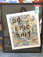 Full view of framed print with glass showing text "DO EPIC SHIT"