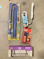 Lot overview showing all four packaged items