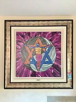 Frontal view of framed painting showing full artwork and frame