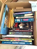 Box showing full assortment of paperbacks and hardcovers