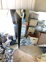 Both frameless rectangular mirrors leaning against wall