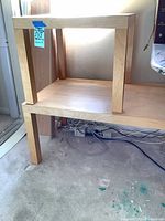 Both tables stacked; shows design and finish