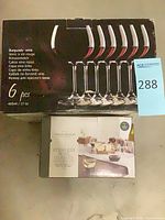 Two boxed sets of Threshold wine glasses, stemmed and stemless