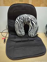 Seat cushion and zebra neck pillow together