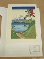 Print mounted on backing sheet with visible label