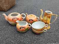 Full set laid out on ground showing all six pieces