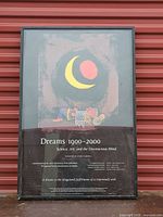 Full view of framed poster showing artwork, frame, and glazing