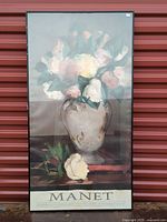 Full view of framed Manet poster showing entire artwork and frame