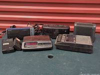 All seven electronic items grouped on table