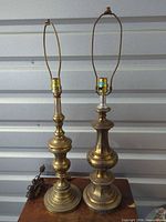 Front view showing both brass-tone lamps with harps and sockets