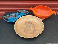 Group shot of three ceramic pieces