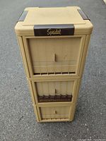 Front view of stacked file box showing three tiers and overall shape