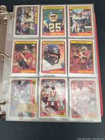 Binder page with Joe Montana, Walter Payton, Jerry Rice Record Breaker cards and others