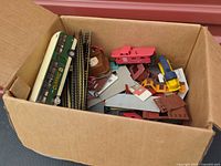 Overview of box showing bus, track, building parts