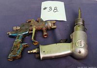 Air hammer and spray gun side by side
