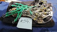 Full view of chains, green tensioners and bag