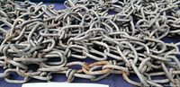 Close view of chain links showing size and slight rust
