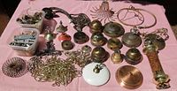 Full layout of all vintage lamp parts on pink cloth