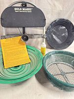 Overall view of Gold Magic concentrator frame, pans, classifier tub, bottle, instruction sheet
