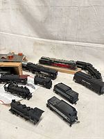 Group shot of all locomotives, tenders and depot