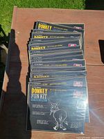 Stack of packaged Donkey Fun Kits