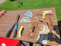 Group shot of all tools on table outdoors