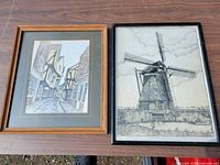 Both framed artworks side by side