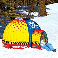 Stock image showing assembled Sno-Fort in snow with children