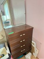 dresser front view with drawers and mirror