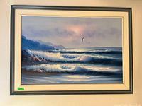 Full view of framed seascape painting